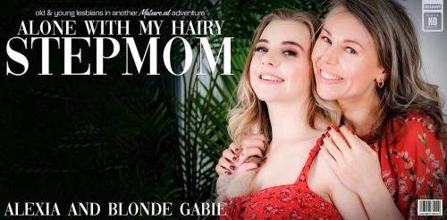 Alexia (48), Blonde Gabie (EU) (24) starring in Hot young Blonde Gabie licking her stepmom Alexia's wet hairy pussy on the couch - Mature.nl (FullHD 1080p)